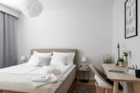 Postel nebo postele na pokoji v ubytování Apartments Borg Dyyni