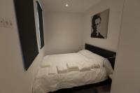 A bed or beds in a room at Las Infantas Zona Centro