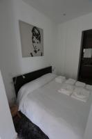 A bed or beds in a room at Las Infantas Zona Centro