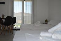 Posteľ alebo postele v izbe v ubytovaní Erika Boutique Apartments