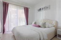 Postel nebo postele na pokoji v ubytování Hortenzija Apartments