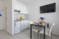 Kuchyň nebo kuchyňský kout v ubytování Hortenzija Apartments