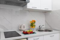 Kuchyň nebo kuchyňský kout v ubytování Hortenzija Apartments
