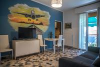 Televízia a/alebo spoločenská miestnosť v ubytovaní FLY HOUSE BOLOGNA...un appartamento al volo