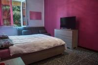 Posteľ alebo postele v izbe v ubytovaní FLY HOUSE BOLOGNA...un appartamento al volo