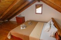 Posteľ alebo postele v izbe v ubytovaní vila halkidiki