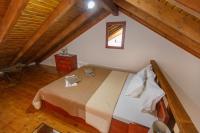 Posteľ alebo postele v izbe v ubytovaní vila halkidiki