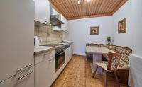 Kuchnia lub aneks kuchenny w obiekcie Appartements Taxach