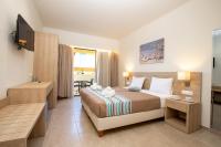 Posteľ alebo postele v izbe v ubytovaní Passas Mare Apartments & Studios