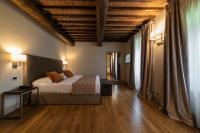 Posteľ alebo postele v izbe v ubytovaní Relais Della Rovere