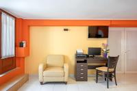 A television and/or entertainment centre at Hotel Aggelos Kefalonia