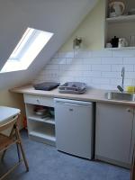 Kuchnia lub aneks kuchenny w obiekcie Gyopár Gyöngye Apartmanház