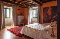 Postel nebo postele na pokoji v ubytování Casa Vistaboa Ribeira Sacra