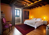 Postel nebo postele na pokoji v ubytování Casa Vistaboa Ribeira Sacra