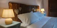 A bed or beds in a room at Il Meriggeto
