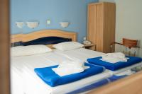 Posteľ alebo postele v izbe v ubytovaní Hôtel Argo