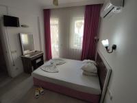 Postel nebo postele na pokoji v ubytování Best Alanya Hotel