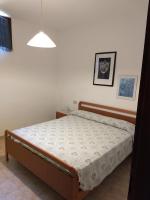 Posteľ alebo postele v izbe v ubytovaní Appartamenti per vacanze Valle Onesta