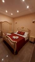 A bed or beds in a room at B&B Orchidea