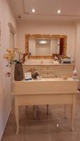 A kitchen or kitchenette at B&B Orchidea