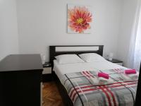 Posteľ alebo postele v izbe v ubytovaní Apartment Varelija