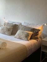 Postel nebo postele na pokoji v ubytování GOLF & BEACH VILLA