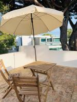 Patio nebo venkovní prostory v ubytování GOLF & BEACH VILLA