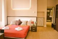 A bed or beds in a room at TheWesley