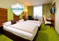 Posteľ alebo postele v izbe v ubytovaní ACHAT Hotel Budapest