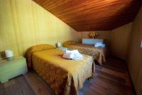 Łóżko lub łóżka w pokoju w obiekcie Casa Vacanze Dante