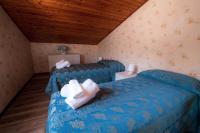 Łóżko lub łóżka w pokoju w obiekcie Casa Vacanze Dante