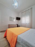 Posteľ alebo postele v izbe v ubytovaní Villa Zizzari A Due Passi Dal Mare