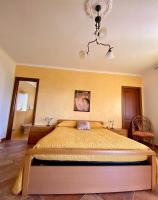A bed or beds in a room at B&B La Torre