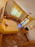 A television and/or entertainment centre at B&B La Torre