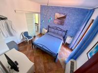 A bed or beds in a room at B&B La Torre