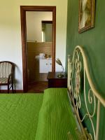 A bed or beds in a room at B&B La Torre