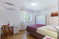Postel nebo postele na pokoji v ubytování Holiday home in Labin/Istrien 8880