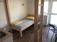 Postel nebo postele na pokoji v ubytování Penzion U Hujňáků