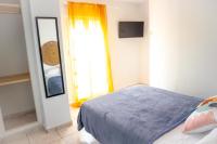 Postel nebo postele na pokoji v ubytování Salitre Rooms