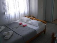 A bed or beds in a room at AGERI STUDIOS
