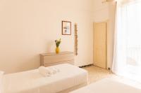 A bed or beds in a room at Casa Labbate