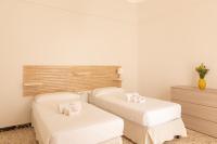 A bed or beds in a room at Casa Labbate