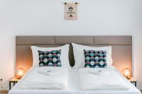 Łóżko lub łóżka w pokoju w obiekcie Jarila Boutique Apartment