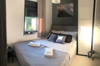 Posteľ alebo postele v izbe v ubytovaní Apartments Jaki