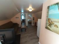 Ein Sitzbereich in der Unterkunft Atlantic Breeze Motel &amp; Apartments