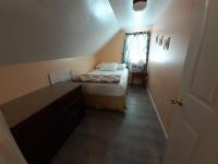 Ein Bett oder Betten in einem Zimmer der Unterkunft Atlantic Breeze Motel &amp; Apartments
