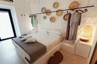 A bed or beds in a room at Corte Manfredi