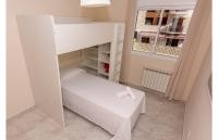 Postel nebo postele na pokoji v ubytování HomeHolidaysRentals Salvador