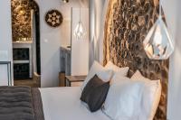 Postel nebo postele na pokoji v ubytování Nostos Apartments