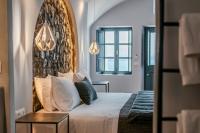 Postel nebo postele na pokoji v ubytování Nostos Apartments